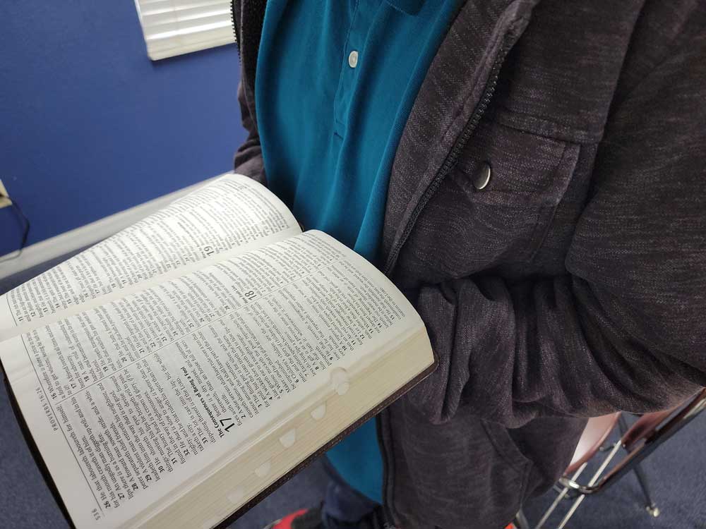 fpa student holding bible